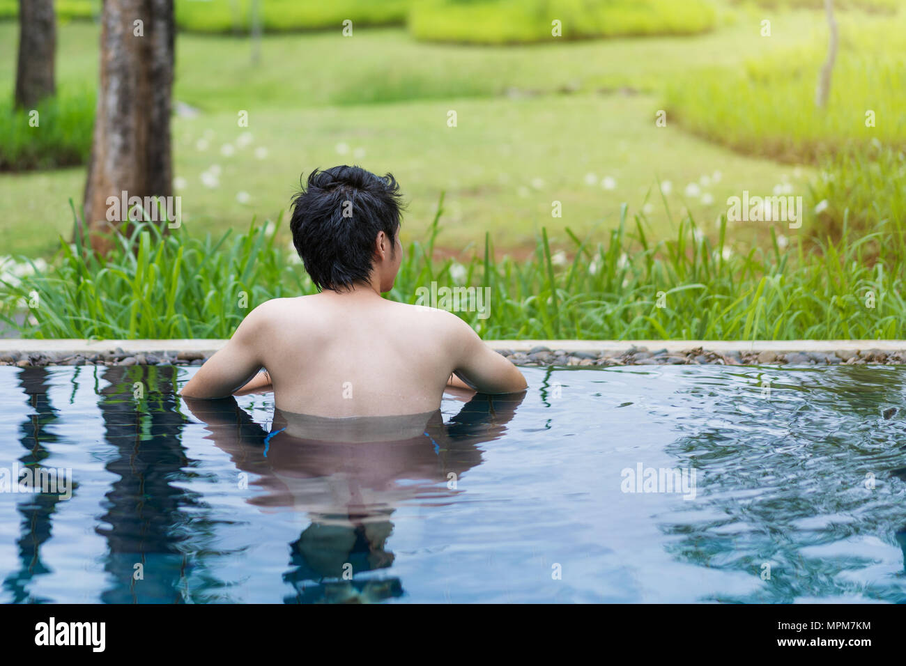 Asian swimming pool man hi-res stock photography and images - Alamy