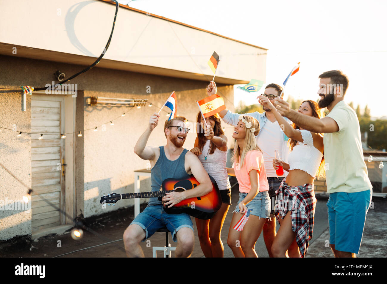 Fun Rooftop Party Friends having fun at rooftop party Stock Photo - Alamy