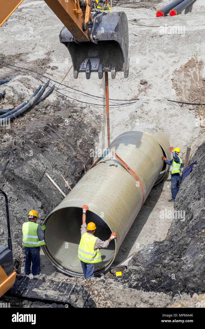 Laying and joining of large diameter fiber reinforced plastic pipes in