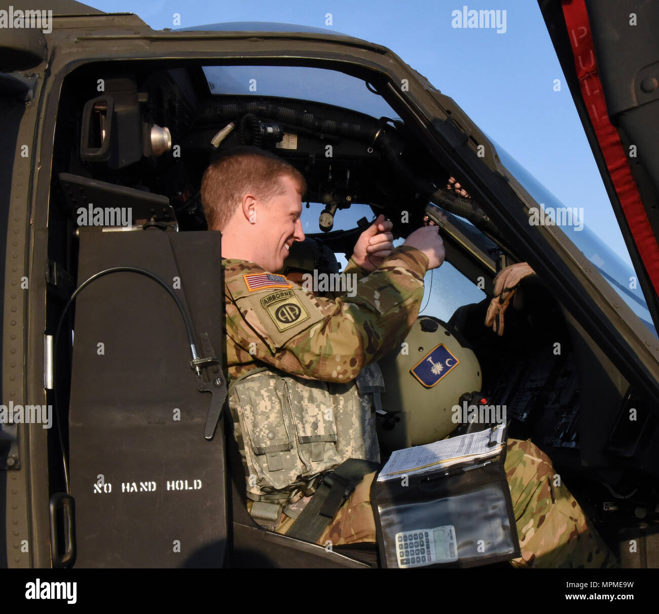 U S Army Chief Warrant Officer 2 Daniel Edwards Detachment 1 Charlie Co 2 238 General Support Aviation Battalion South Carolina Army National Guard Prepares To Copilot A Uh 60 Black Hawk Flying Alongside Georgia