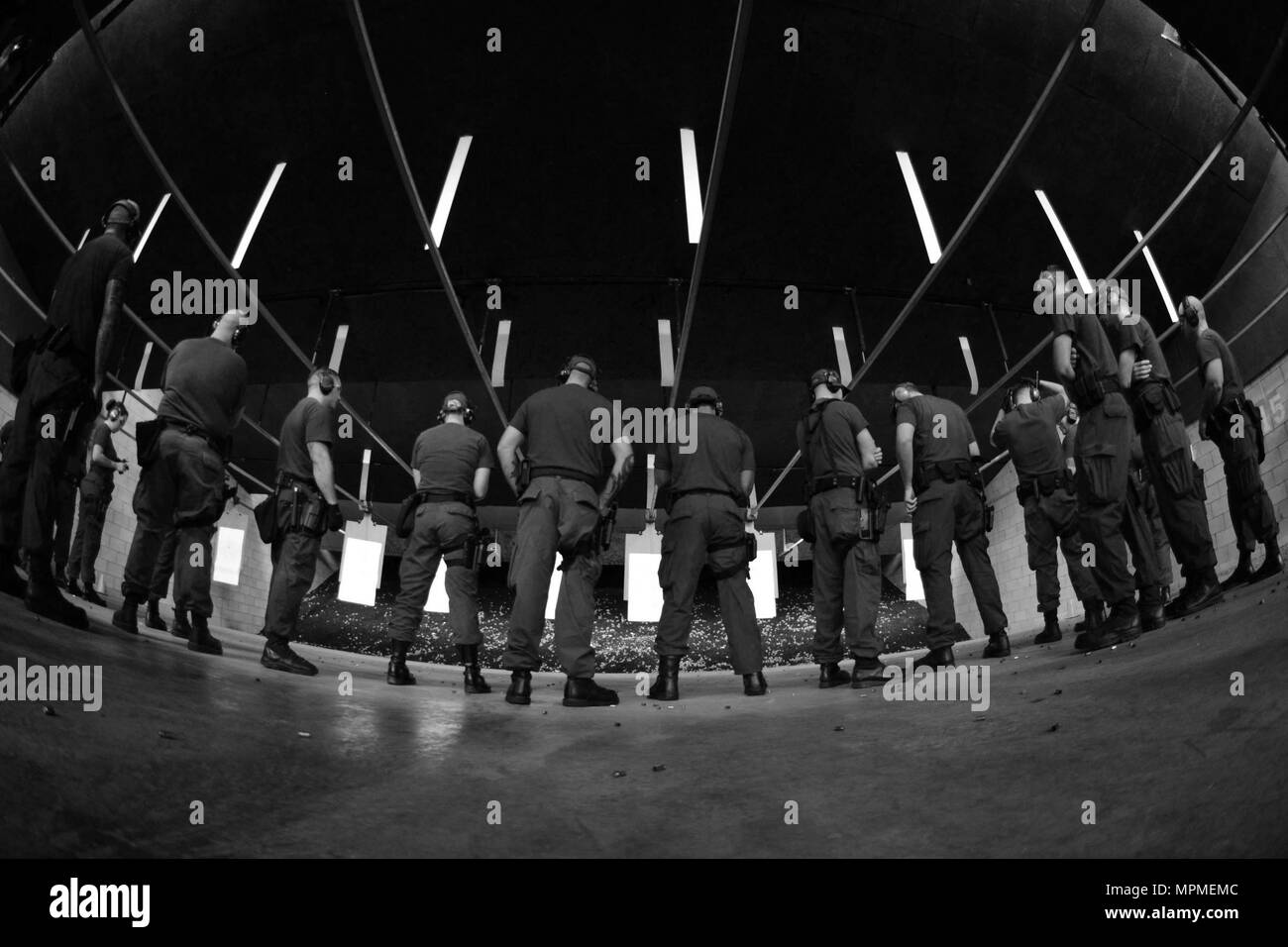 Coast Guard crewmembers prepare to conduct a live fire exercise during
