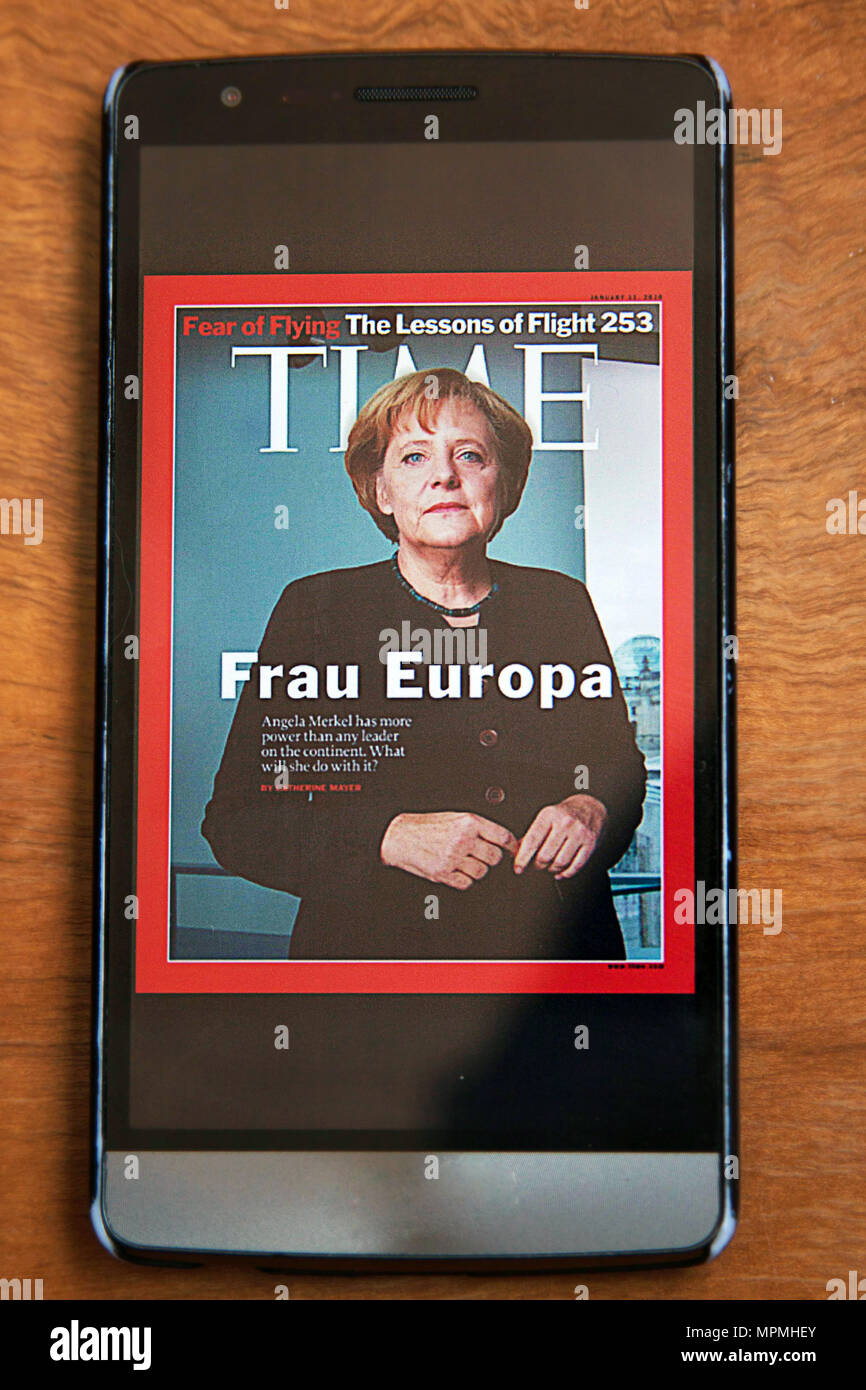 Angela Merkel on the Cover of Time magazine on a Smartphone Stock Photo