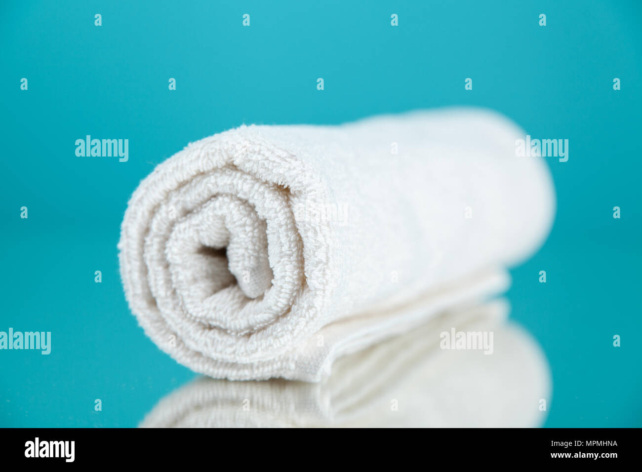 Pile of white towels Stock Photo Alamy
