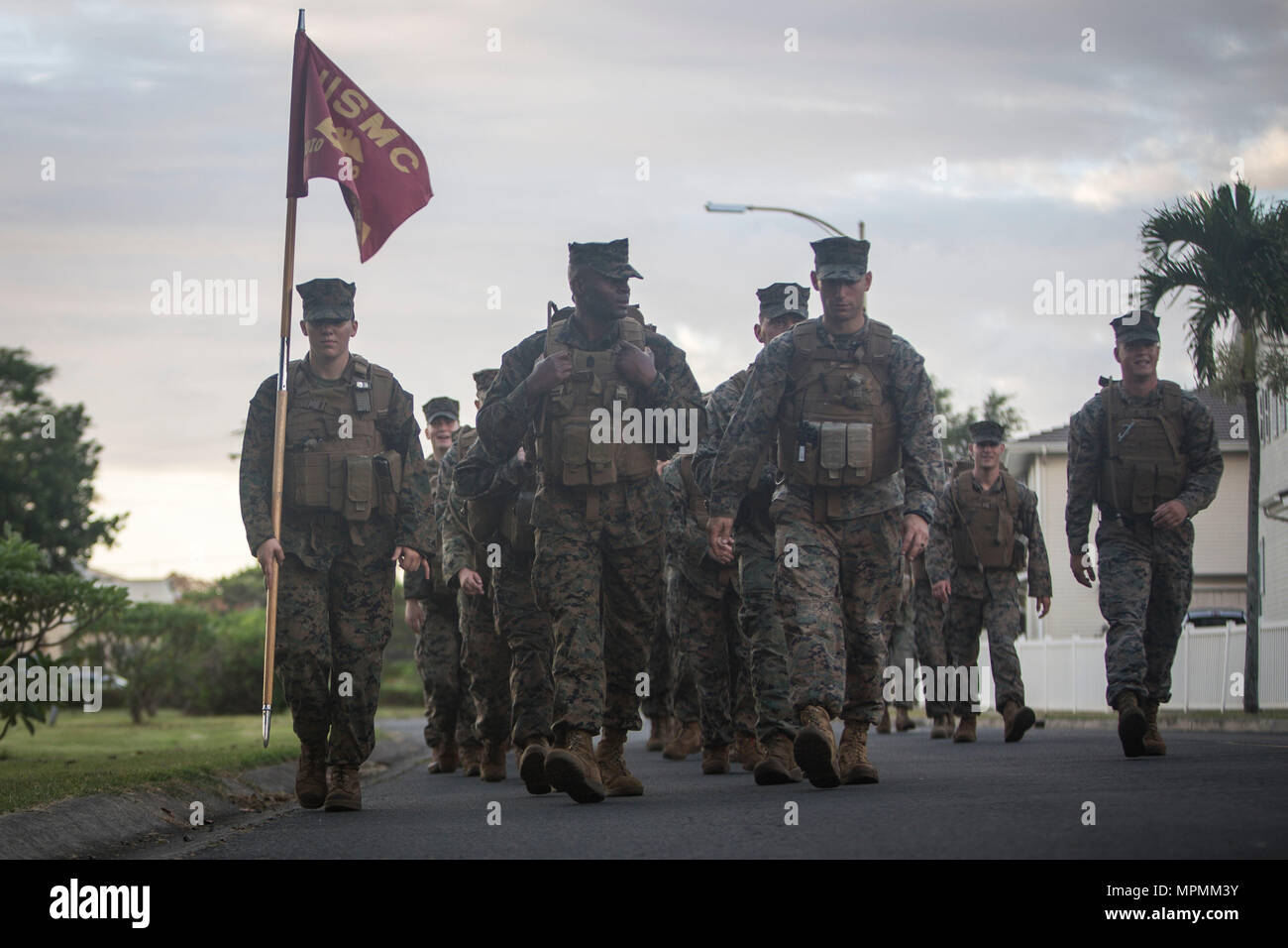 Marines with Alpha Company, 3rd Radio Battalion conduct a hike aboard