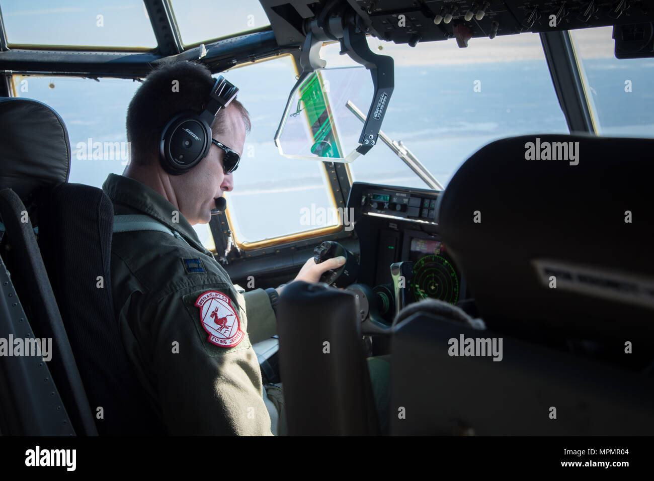 Capt. Nick Foreman, 815th Airlift Squadron pilot, flies a C-130J