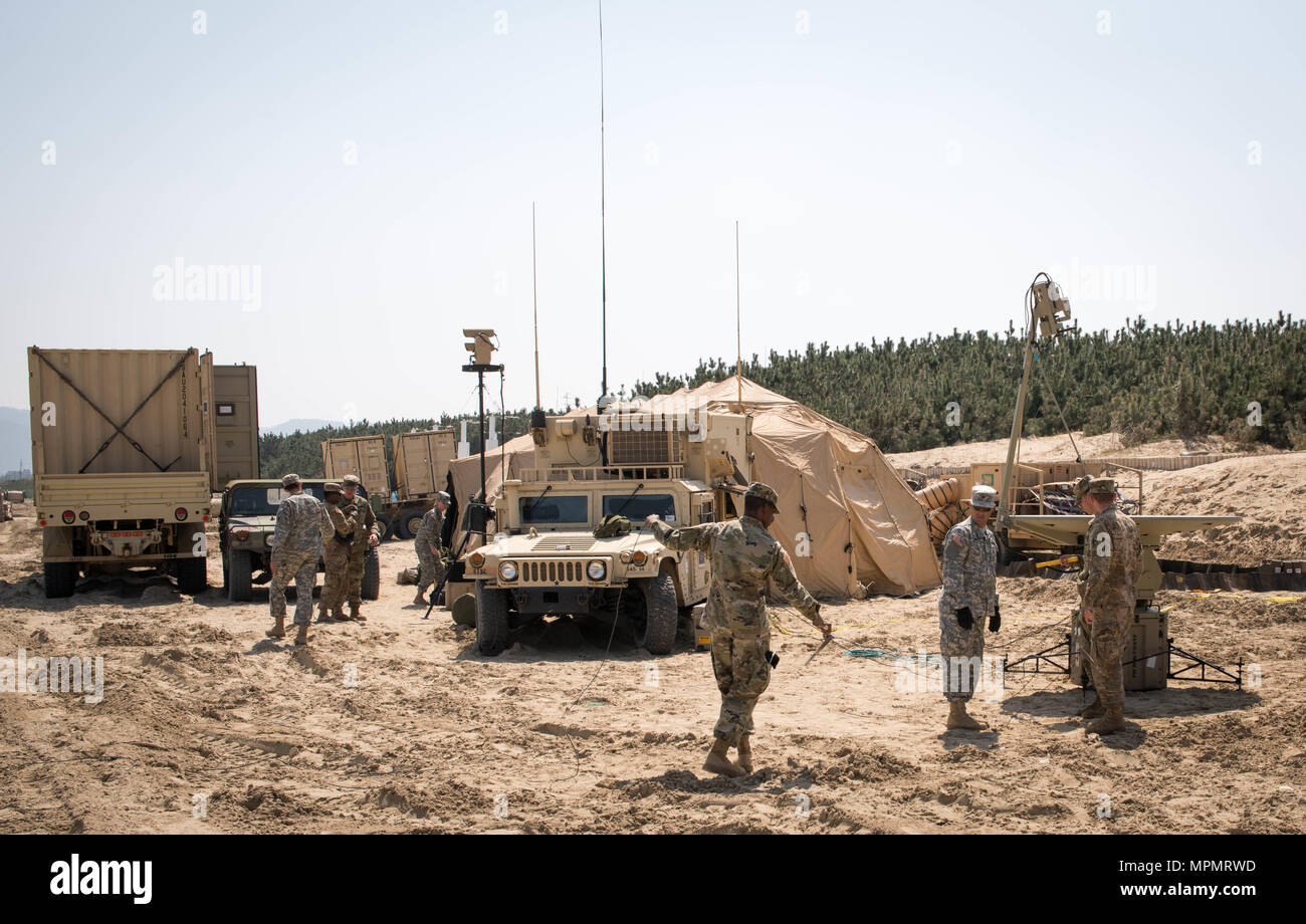 POHANG, Republic of Korea (April 4, 2017) – U.S. Army Soldiers attached to Harbormaster Command and Control Center setup their tactical operation center on Dogu Beach during Operation Pacific Reach Exercise 2017 (OPRex17). OPRex17 is a bilateral training event designed to ensure readiness and sustain the ROK-U.S.  Alliance by exercising an Area Distribution Center (ADC), an Air Terminal Supply Point (ATSP), Combined Joint Logistics Over-the-Shore (CLOTS), and the use of rail, inland waterways, and coastal lift operations to validate the operational reach concept. (U.S. Navy photo by Mass Commu Stock Photo