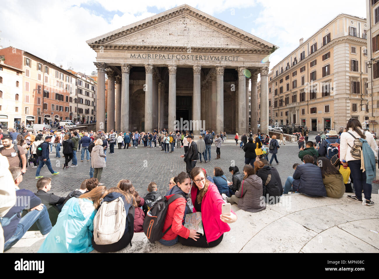 Rome Italy, , group of asian  tourists walking in street,  discovering  city center Stock Photo