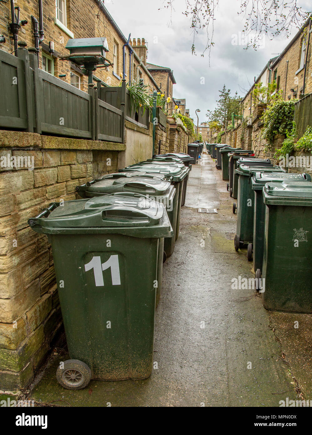Narrow path between bins hires stock photography and images Alamy