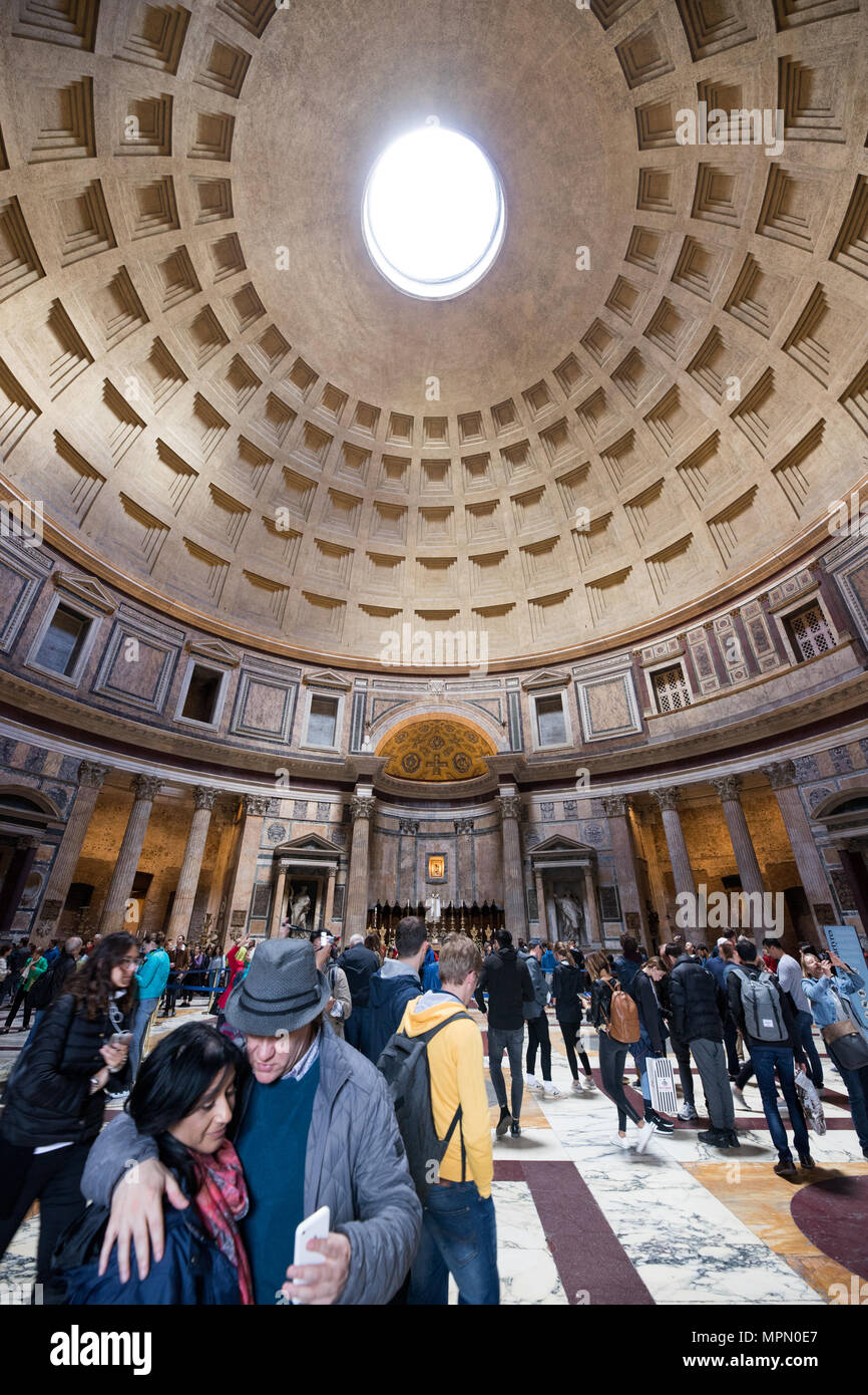 Pantheon interior scene, tourists visiting the monument,  Rome italy Stock Photo