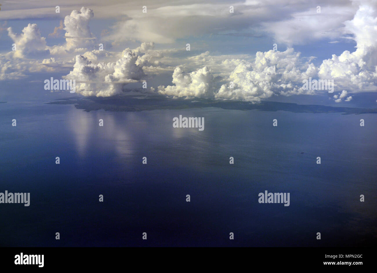 Stormy weather over and island in the Visayas, Philippines. Stock Photo