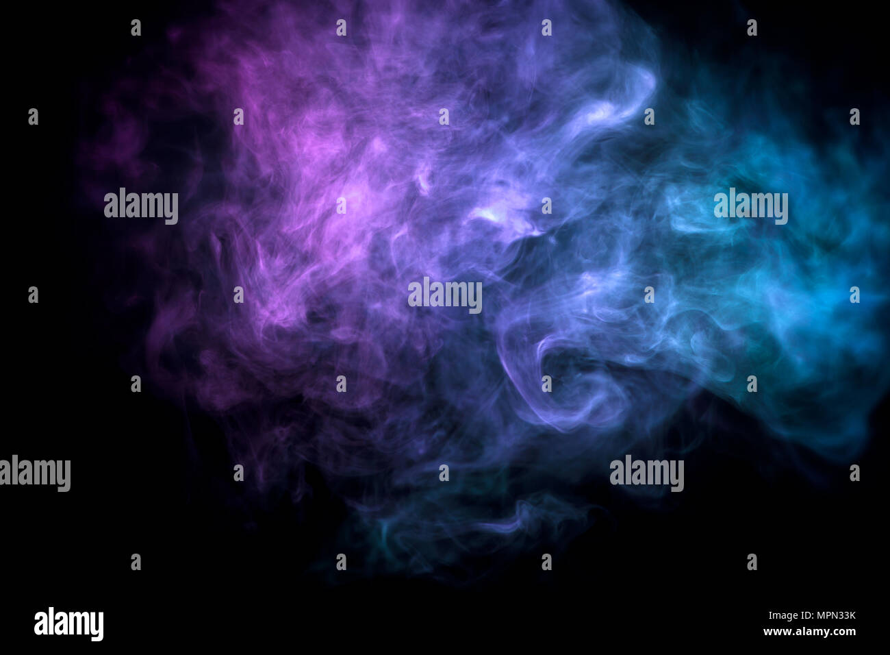 Cloud of blue and pink smoke on a black isolated background. Background ...