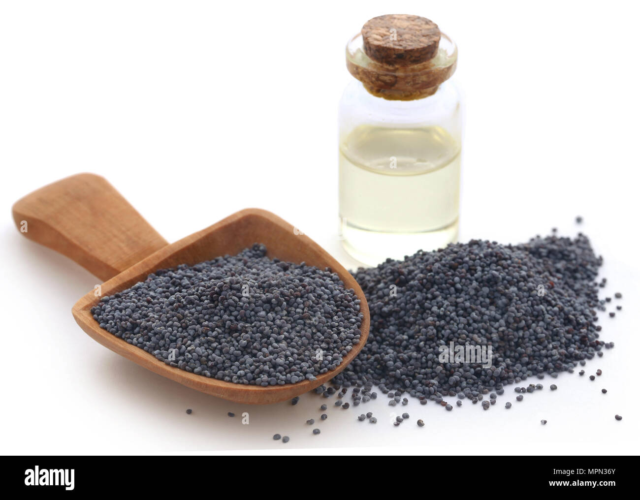 Poppy seeds with extract in a small jar Stock Photo Alamy
