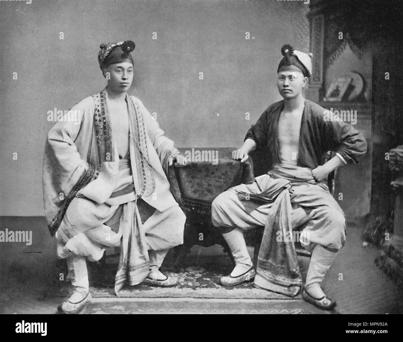 Chinese actors, 1902. Artist: CC Pierce & Co. Stock Photo