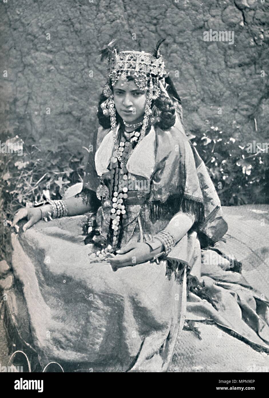 An Algerian woman in gala costume, 1912. Artist: Neurdein freres. Stock Photo