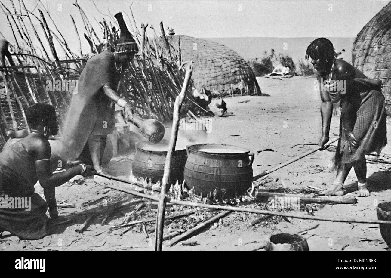 Zulu wives brewing utshwala (beer), Natal, 1912. Artist: Unknown. Stock Photo