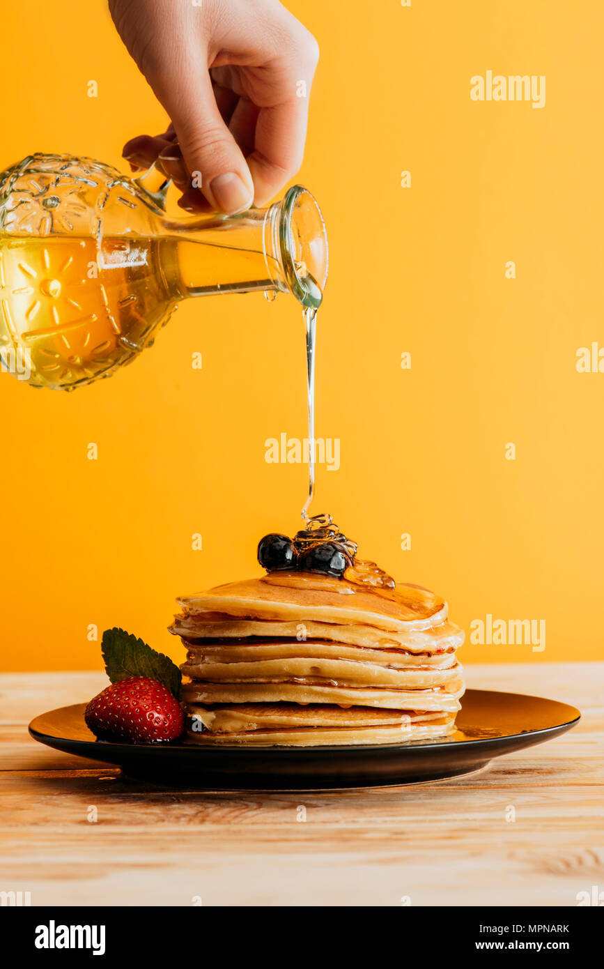 Syrup pouring onto pancakes hires stock photography and images Alamy