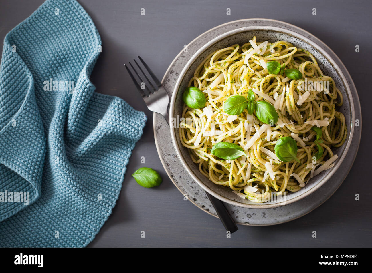 spaghetti pasta with avocado basil pesto sauce Stock Photo Alamy