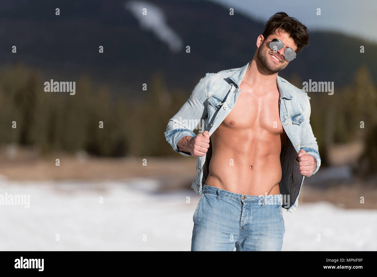 Adult male model wearing jeans hi-res stock photography and images - Alamy