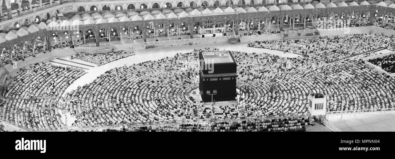 Muslims Prayer Around AlKaaba in Mecca, Saudi Arabia, Aerial View Stock Photo