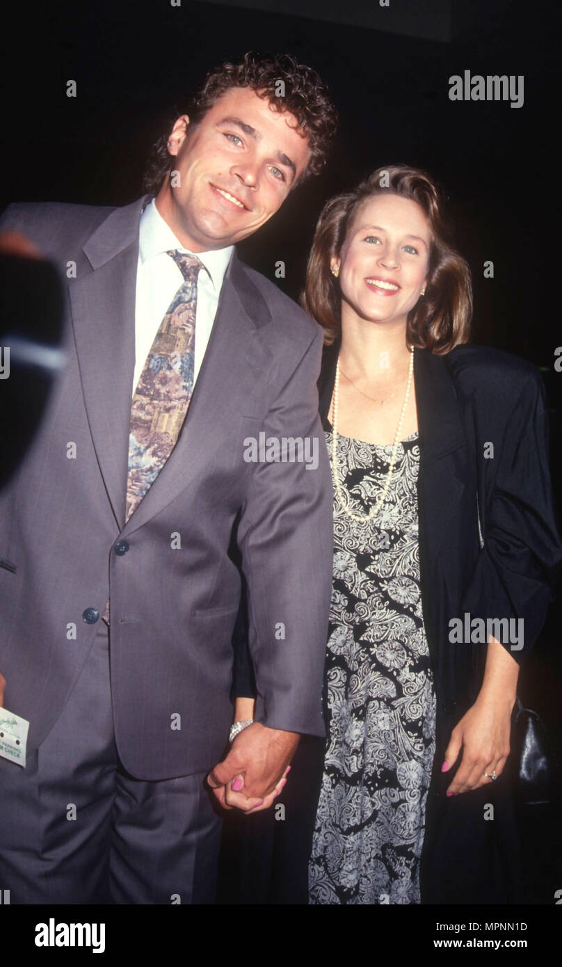 BEVERLY HILLS, CA - FEBRUARY 28: (L-R) Actor John J. York and wife Vicki Manners attend the West Coast Premiere of 'Superstar: The Life & Times of Andy Warhol' on February 28, 1991 at Music Hall Theater in Beverly Hills, California. Photo by Barry King/Alamy Stock Photo Stock Photo