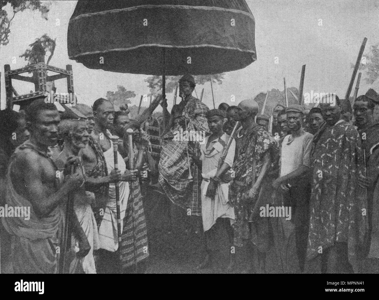 'The Subdued King of Akim Carried on his Chair of State', 1902. Artist: Unknown. Stock Photo