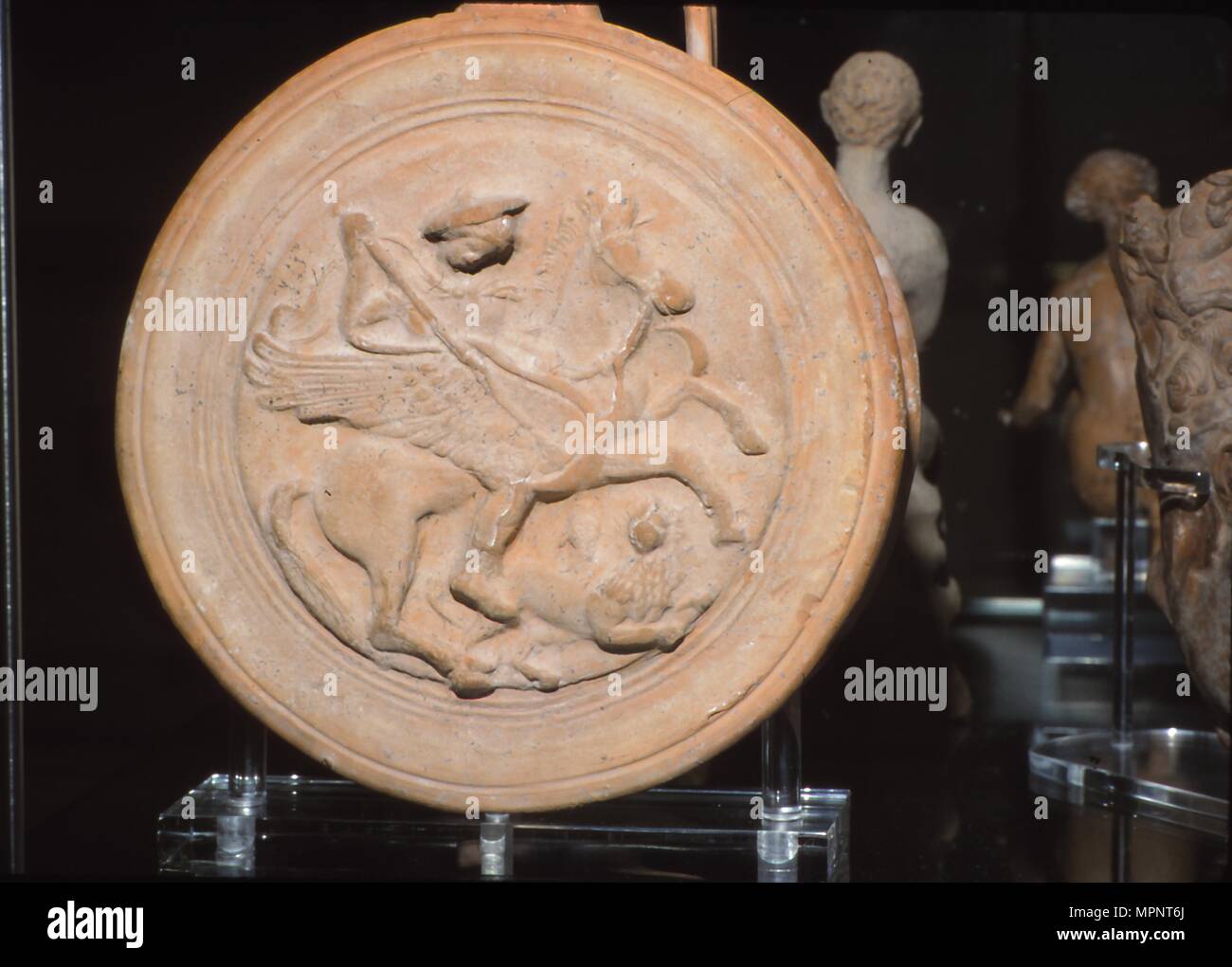 Terracotta Flask with moulded medallion, Bellerophon killing the Chimaera, c300BC-c250BC. Artist: Unknown. Stock Photo