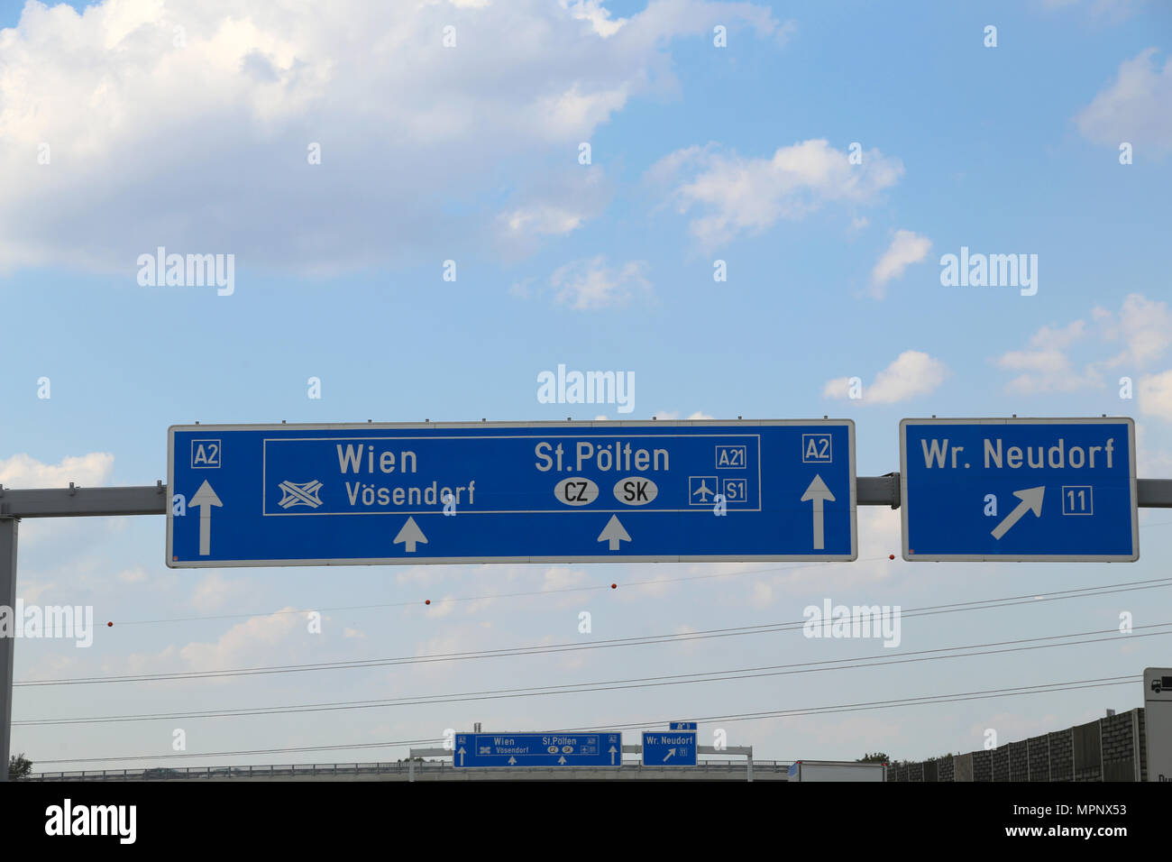 Sign of the Austrian motorway with directions to the city of Vienna Or to continue in the Czech Republic or Slovakia Stock Photo