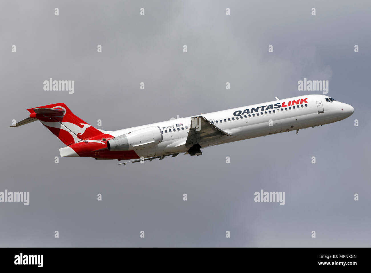 QantasLink Boeing 717 airliner VH-YQS departing Melbourne International Airport. Stock Photo