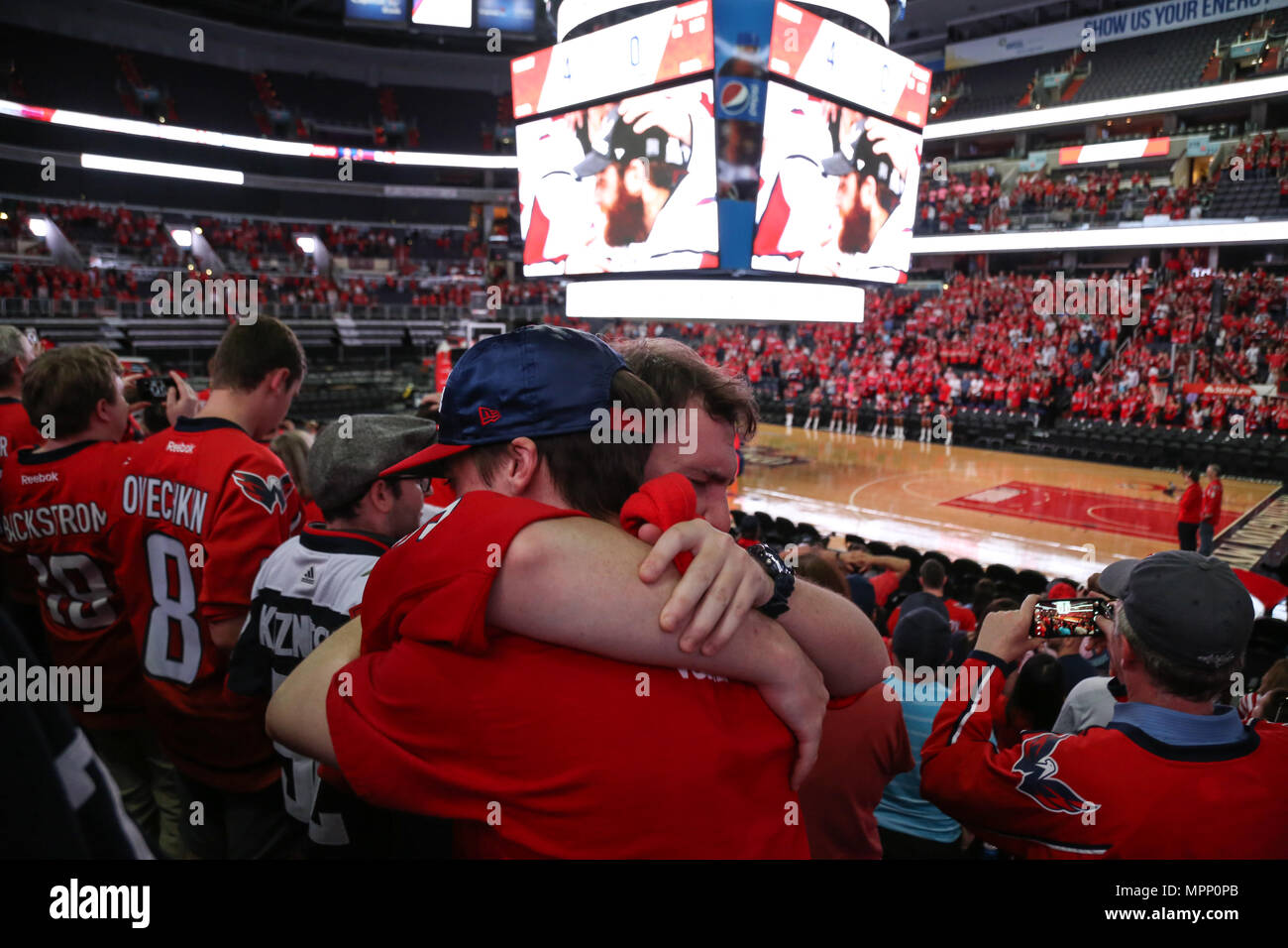 Washington, USA. 23rd May, 2018. Two Capitals fans embrace each other