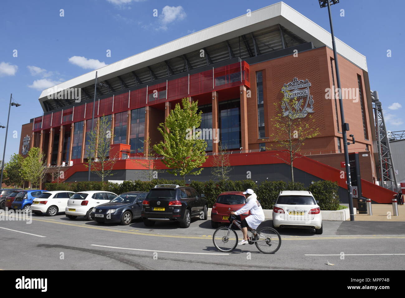 Liverpool, UK 24th May 2018.The Main Stand at Anfield. Decorations and flags go up on houses and pubs near Anfield, the home ground of Liverpool Football Club. Fans are preparing for their teams appearance in the Champions League Final on Saturday 26th May 2018. It is first time Liverpool FC have appeared in the final since 2005. Credit: David Colbran/Alamy Live News Stock Photo