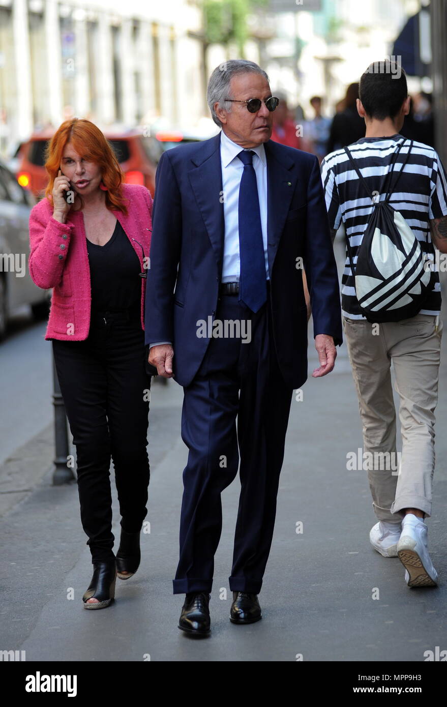 Milan, Giuliano Adreani and wife walking downtown Giuliano Adreani