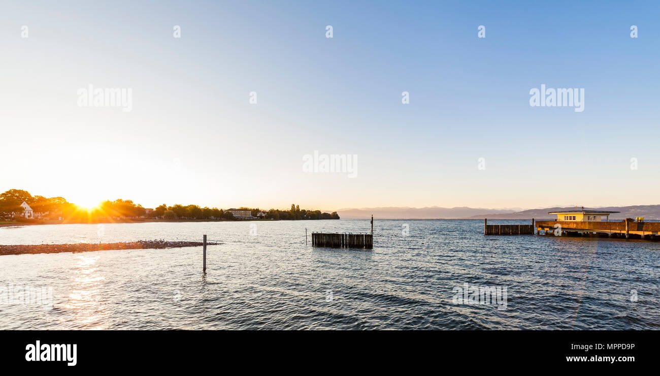 Germany, Baden-Wuerttemberg, Langenargen, Lake Constance, shipping pier at sunrise Stock Photo