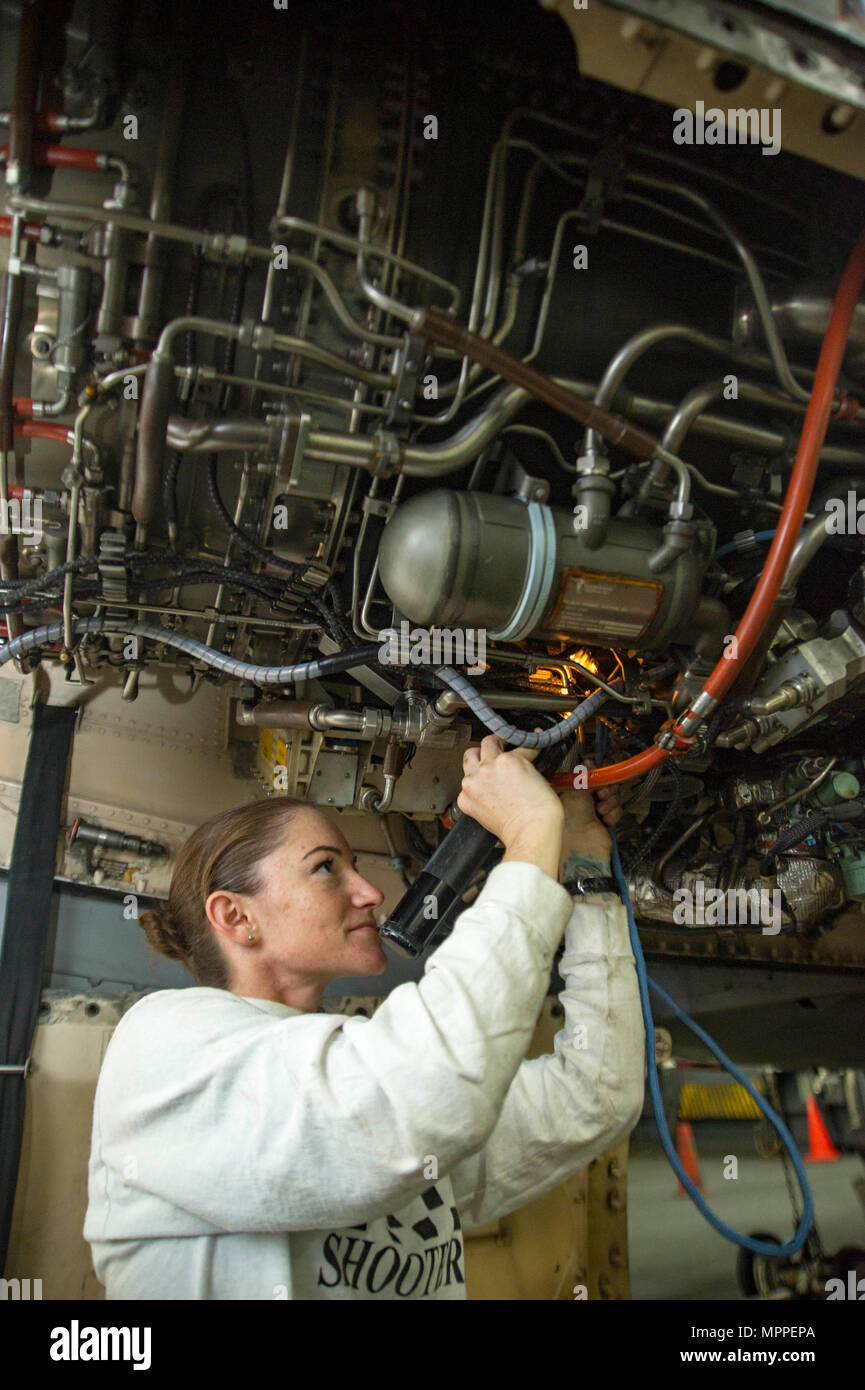 An Aviation Machinist’s Mate conducts an engine inspection on an F/A ...