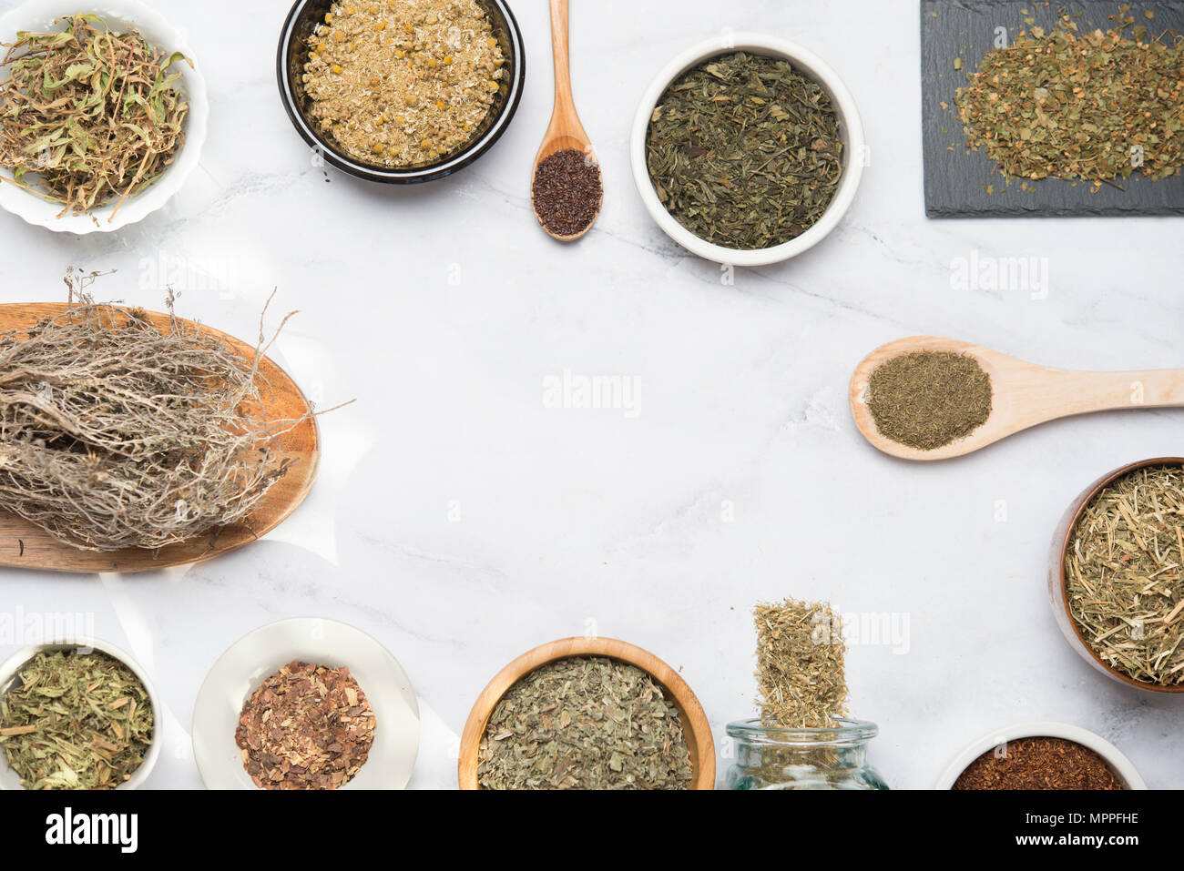 Various herbal infusions, chamimile, mint, rooibos, thyme, green tea, tisane Stock Photo