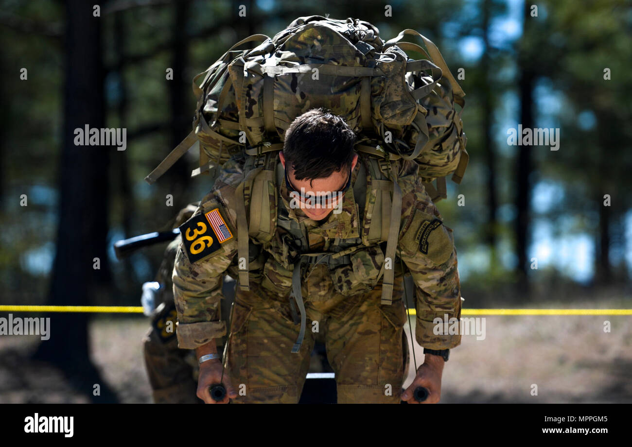 Ruck March Ranger 75th Ranger Regiment soldiers lift weighted litters during the Best ...