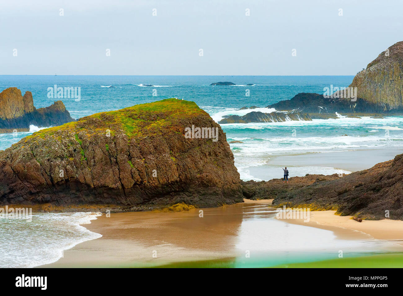Seal Rock, Oregon, USA May 3, 2016 A lady is drawft standing next