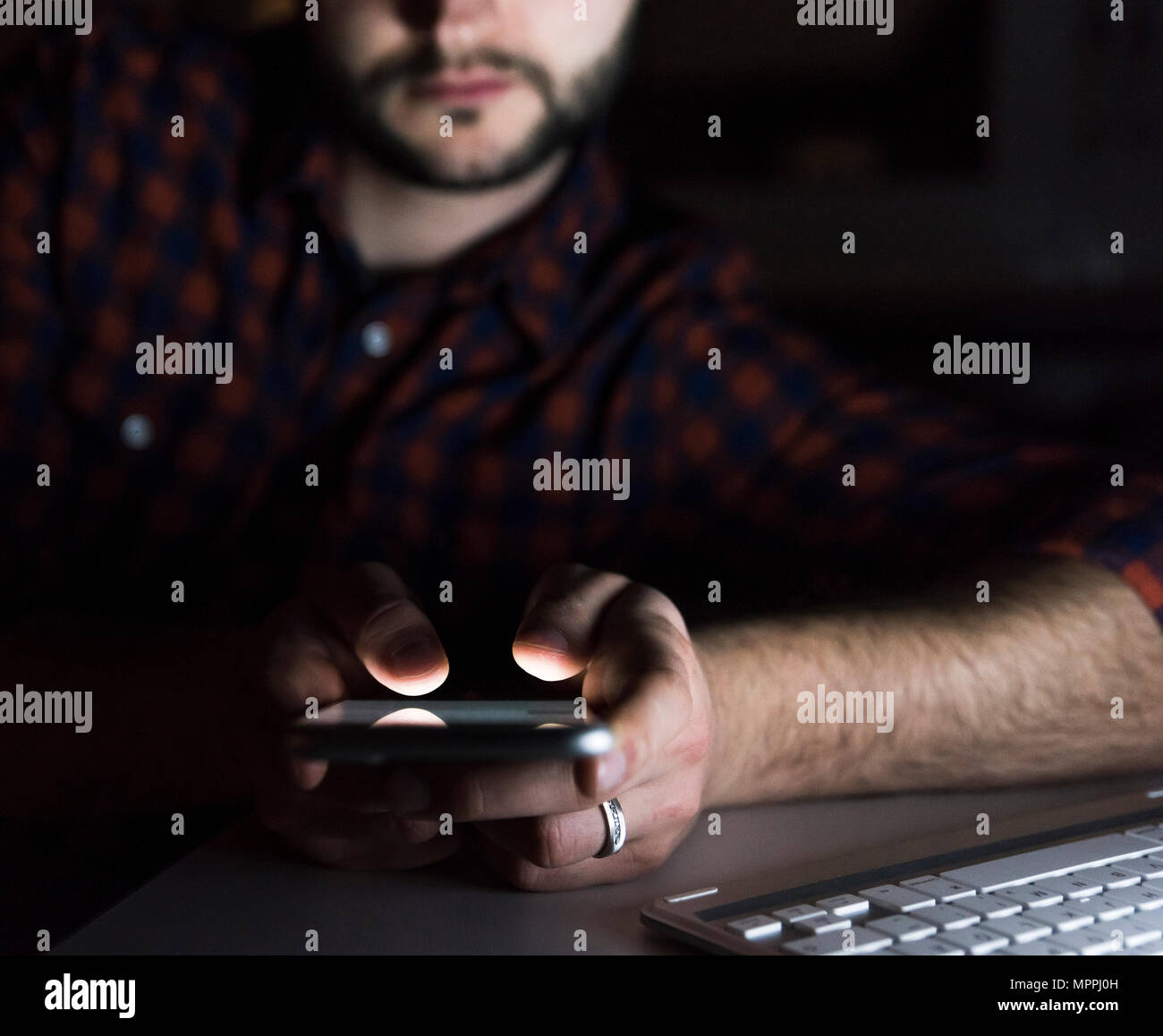 Man using smartphone, close-up Stock Photo