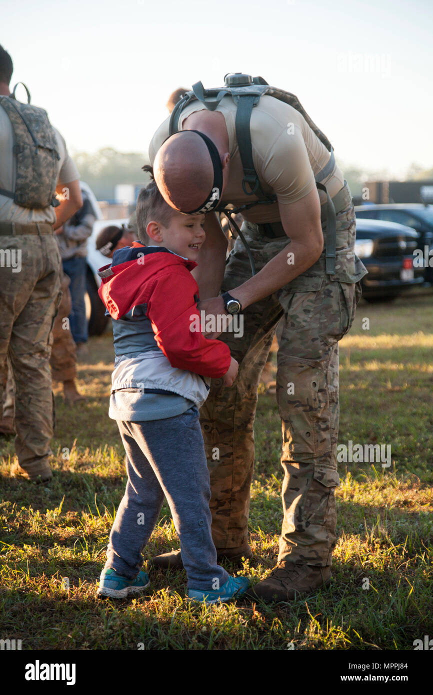 A U.S. Army Ranger greets his son prior to competing in the Spartan ...