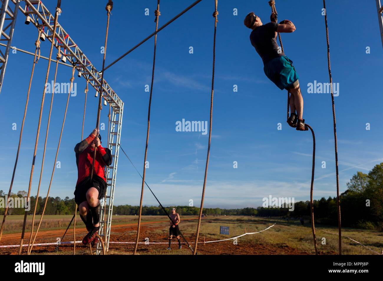 Spartan Race competitors perform a rope climb during a Spartan Race at the  Best Ranger Competition 2017 in Fort Mitchell, Ala., April 8, 2017. The  34th annual David E. Grange Jr. Best Ranger Competition 2017 is a three-day  event consisting of challenges