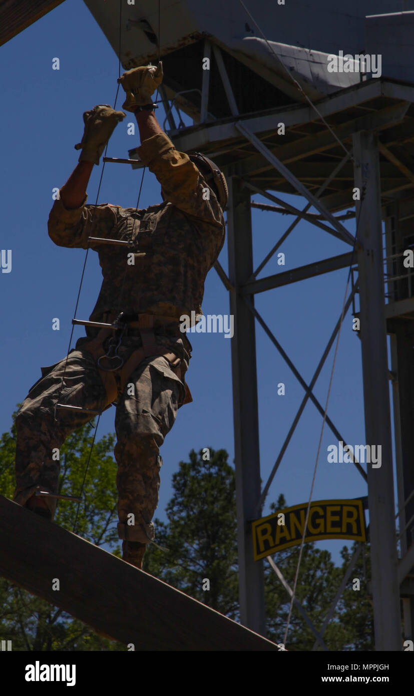 Army Ranger Ladder Man A U.S. Ranger climbs a ladder on the Tri-Tower Challenge during The ...