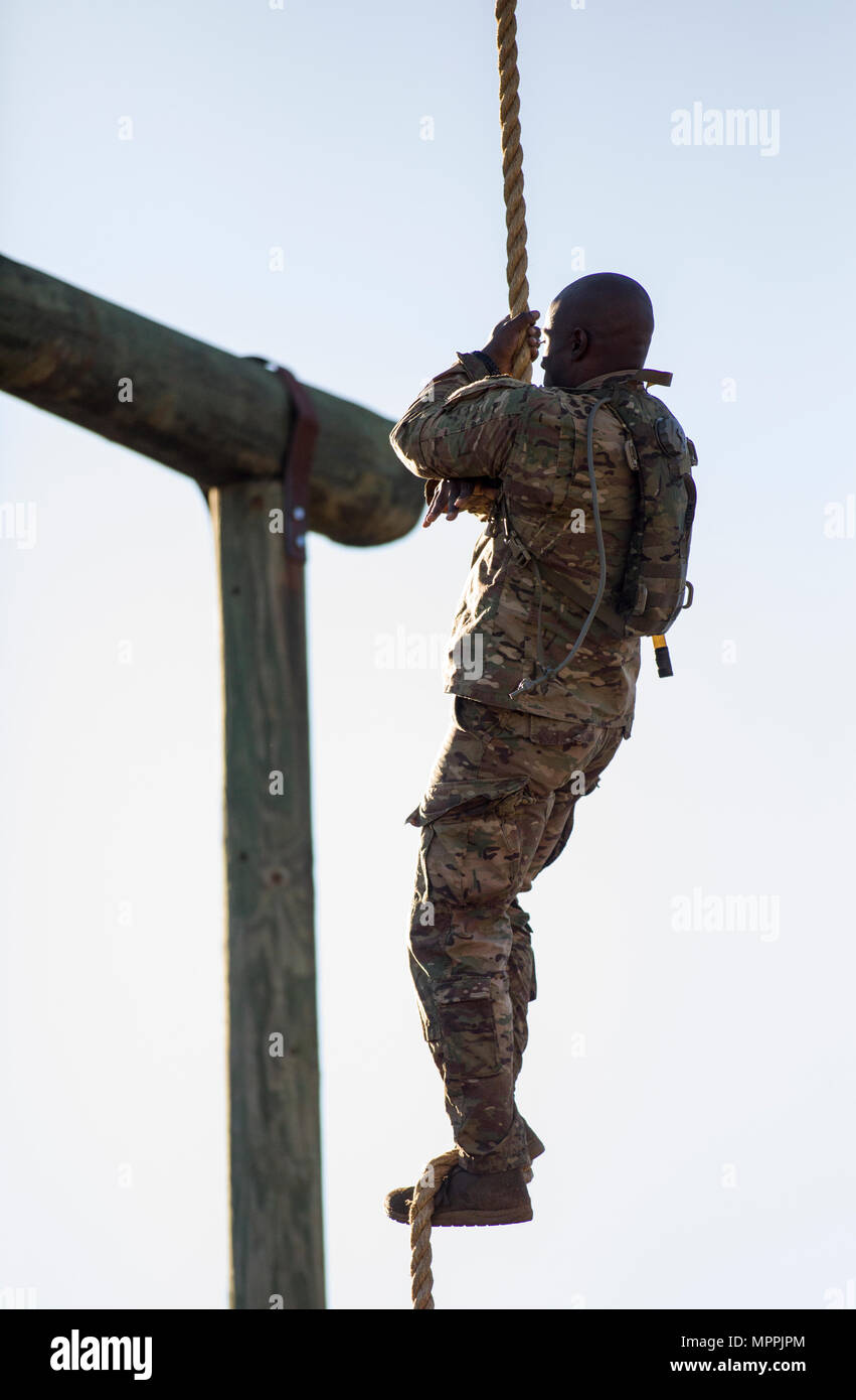 A U.S. Army Ranger from the 82nd Airborne Division climbs a rope ...