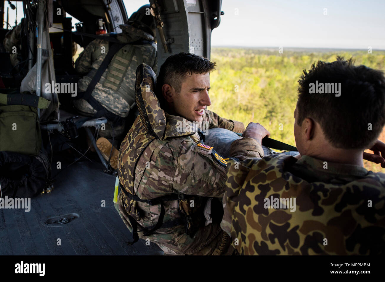 U.S. Army Rangers prepare for a helicopter water insertion from a UH-60 ...