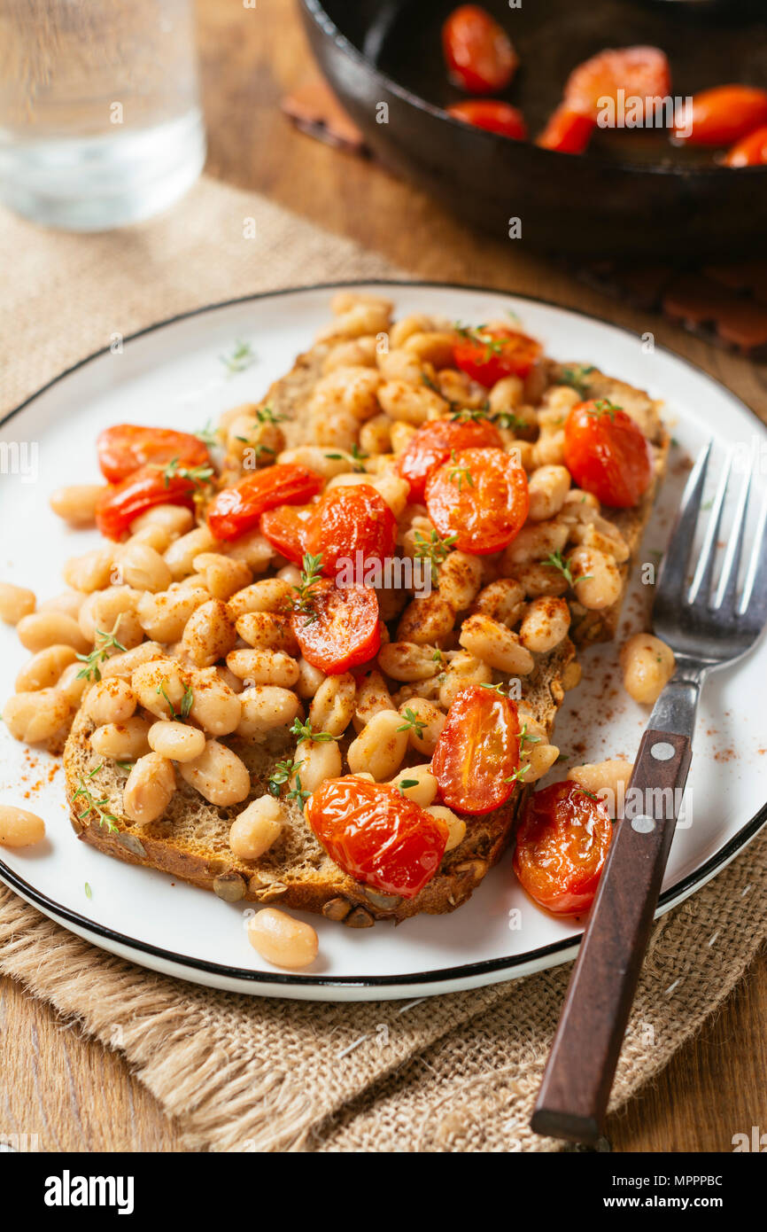 White bean and tomato ragout on toast, white beans, vegetable bouillon