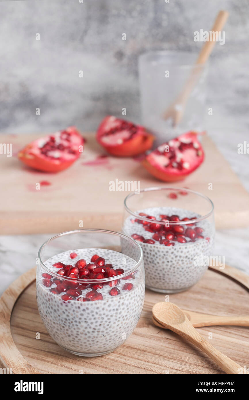 Two glasses of chia pudding with pomegranate seed Stock Photo