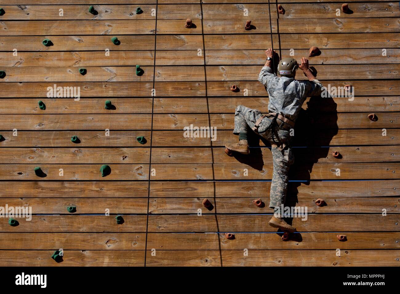 A U.S. Army Ranger performs a wall climb during the Best Ranger Competition 2017, Fort Benning