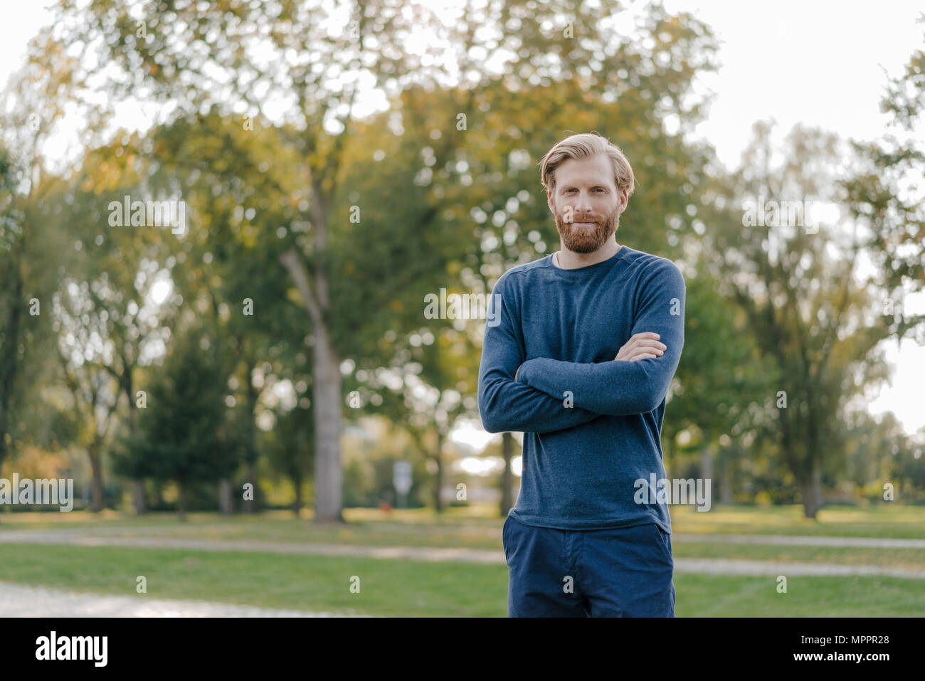 Portrait of man in a park Stock Photo