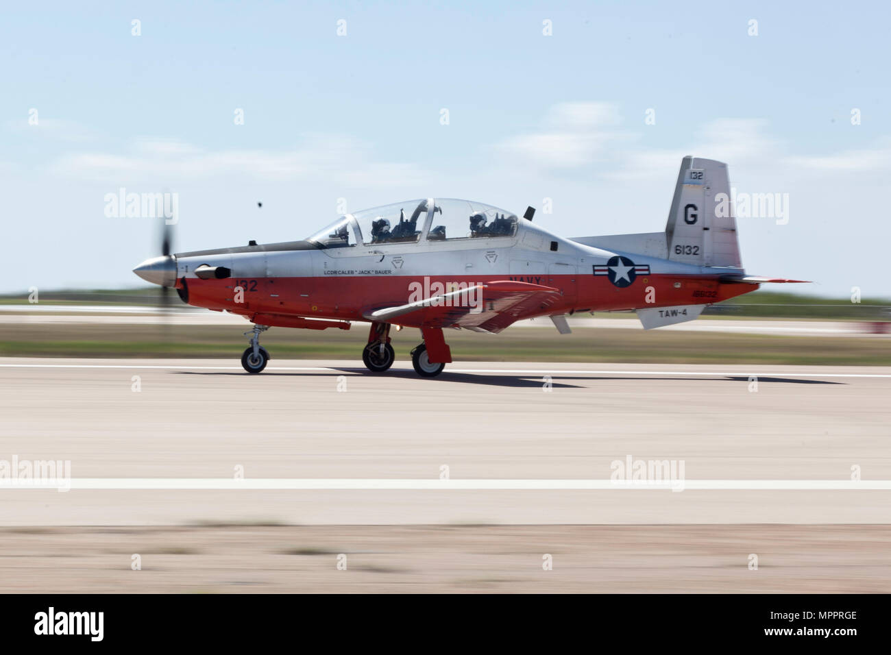 U.S. Marine Corps officers assigned to the Basic Flight Training Course, Training Air Wing Four, land a T-6B training aircraft at Naval Air Station Corpus Christi, Texas, March 20, 2017. The mission of Training Air Wing Four is to provide basic flight training as well as intermediate and advanced flight training using multi-engine aircraft. (U.S. Marine Corps photo by Lance Cpl. Jose Villalobosrocha) Stock Photo