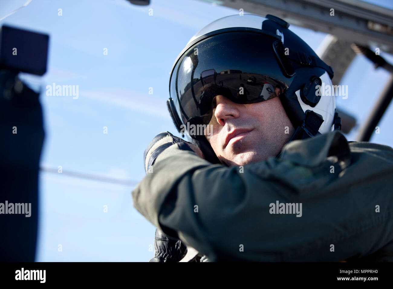 U.S. Marine Corps Capt. Trey Harden, an instructor assigned to the Basic Flight Training Course, Training Air Wing Four, conducts a preflight check on a T-6B training aircraft at Naval Air Station Corpus Christi, Texas, March 20, 2017. The mission of Training Air Wing Four is to provide basic flight training as well as intermediate and advanced flight training using multi-engine aircraft. (U.S. Marine Corps photo by Lance Cpl. Jose Villalobosrocha) Stock Photo