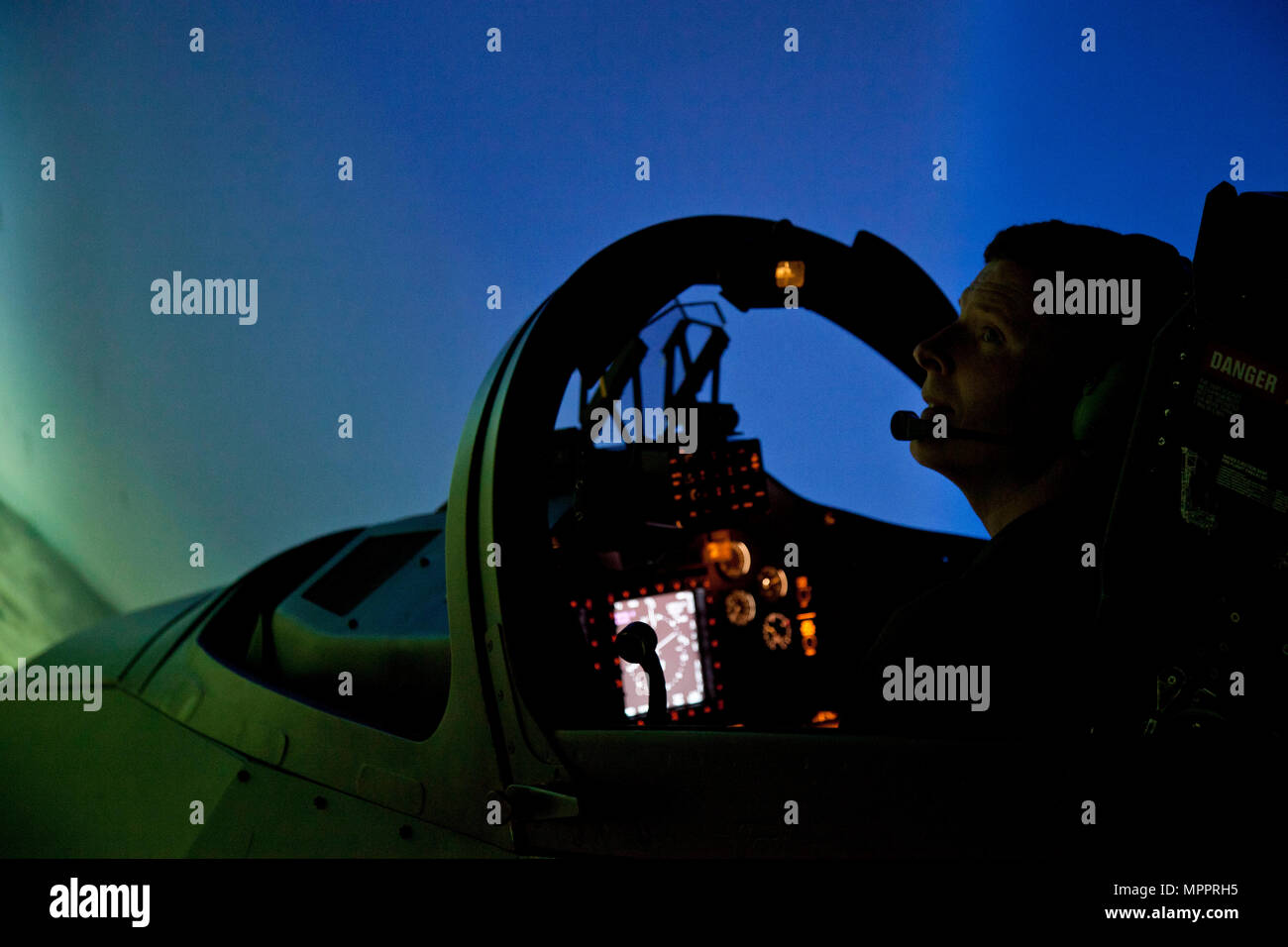 A U.S. Marine Corps officer assigned to the Undergraduate Level Pilot Training course, Training Air Wing Two, uses a T-45C training aircraft simulator at Naval Air Station Kingsville, Texas, March 21, 2017. The mission of Training Air Wing Two is to provide undergraduate level pilot training for Marines to prepare them for the Fleet Marine Force. (U.S. Marine Corps photo by Lance Cpl. Jose Villalobosrocha) Stock Photo