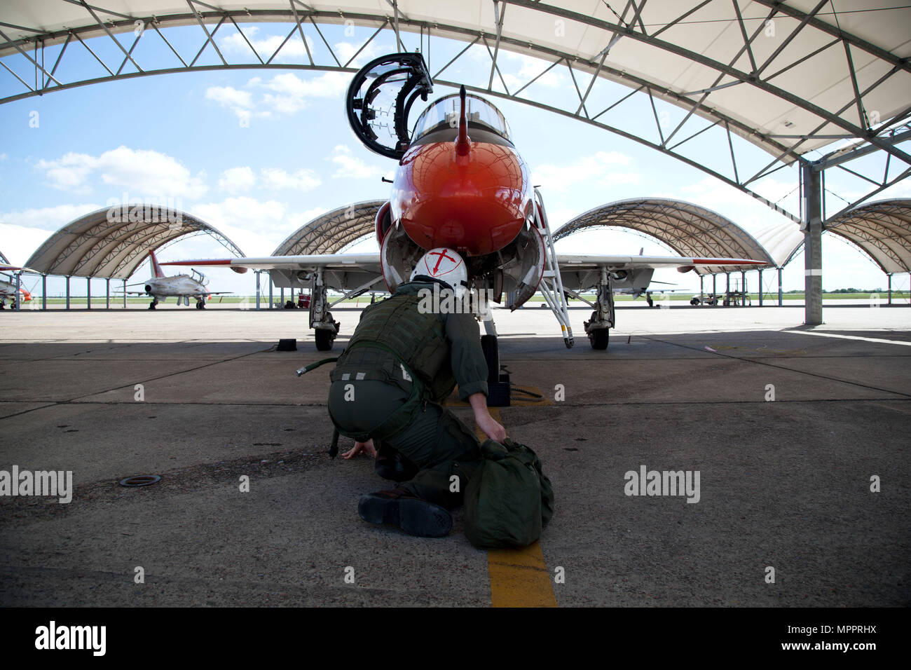 U.S. Marine Corps Lt. Col. Jeremy W. Siegel, executive officer of Training Air Wing Two, conducts a preflight check on a T-45C training aircraft at Naval Air Station Kingsville, Texas, March 21, 2017. The mission of Training Air Wing Two is to provide undergraduate level pilot training for Marines to prepare them for the Fleet Marine Force. (U.S. Marine Corps photo by Lance Cpl. Jose Villalobosrocha) Stock Photo